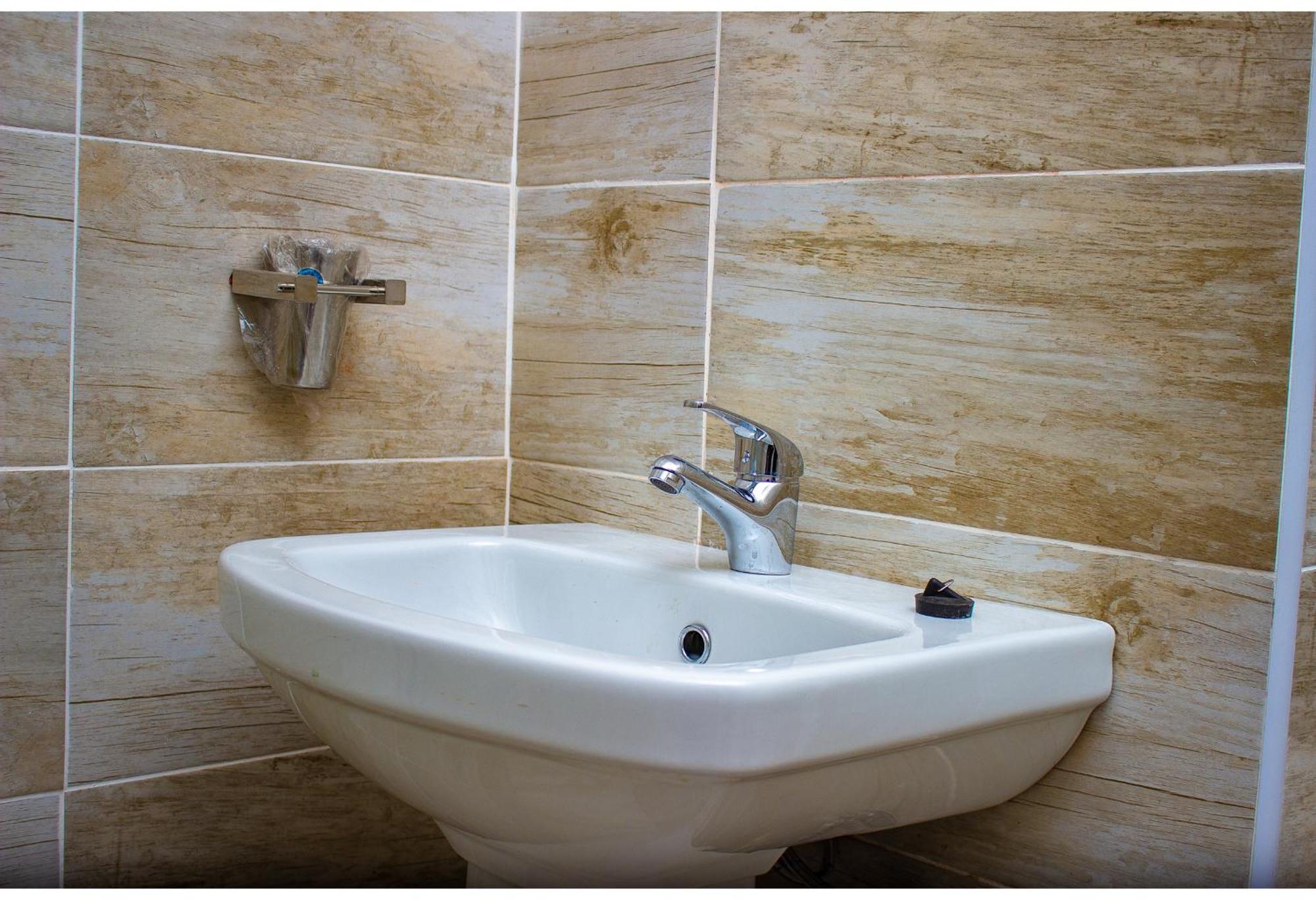 R Executive Apartments ฮาราเร ภายนอก รูปภาพ